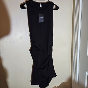 Black Sleeveless Dress, Ruched.  Gathers on sides.  Womens size small